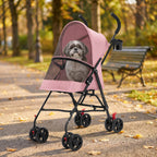 Un vieux shih tzu dans la poussette porte-gobelet rose, sur une allée de parc en automne (illustration)